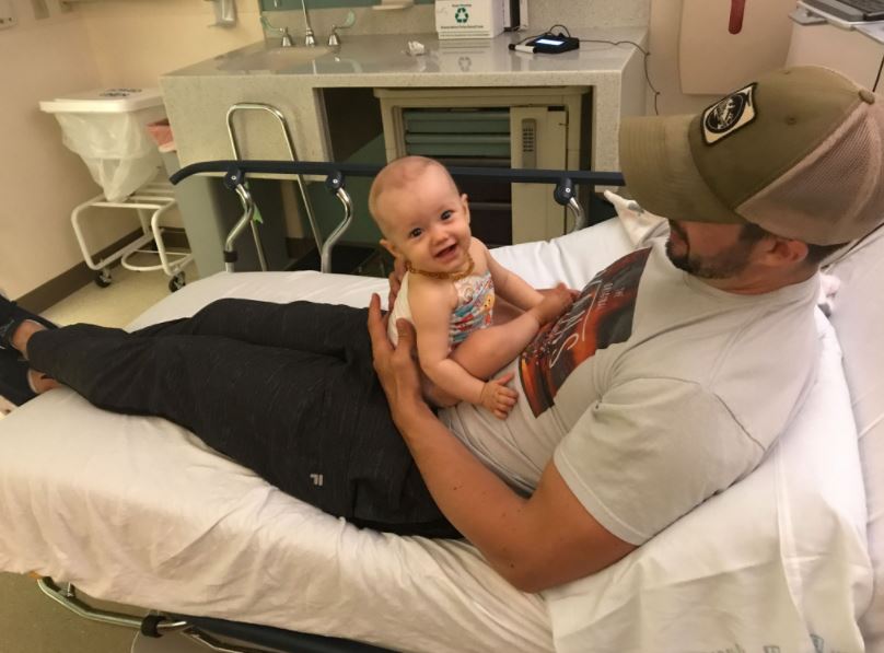 Comrade Evan Turner and his daughter Lillian.